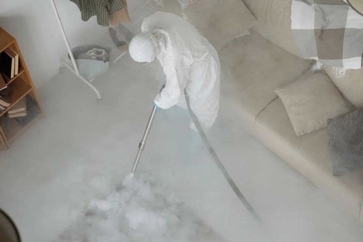 Biohazard cleanup technician in protective equipment, Lorton, VA